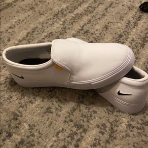 Nike women’s court royals slip ons